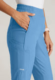 GREYS ANATOMY EVOLVE - F 6PKT  Classic Mid Tapered Cosmo Pant  360 Stretch