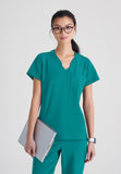 GREYS ANATOMY EVOLVE - F 1PKT  Classic   Sway Tuck-In Top  360 Stretch