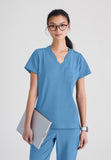 GREYS ANATOMY EVOLVE - F 1PKT  Classic   Sway Tuck-In Top  360 Stretch